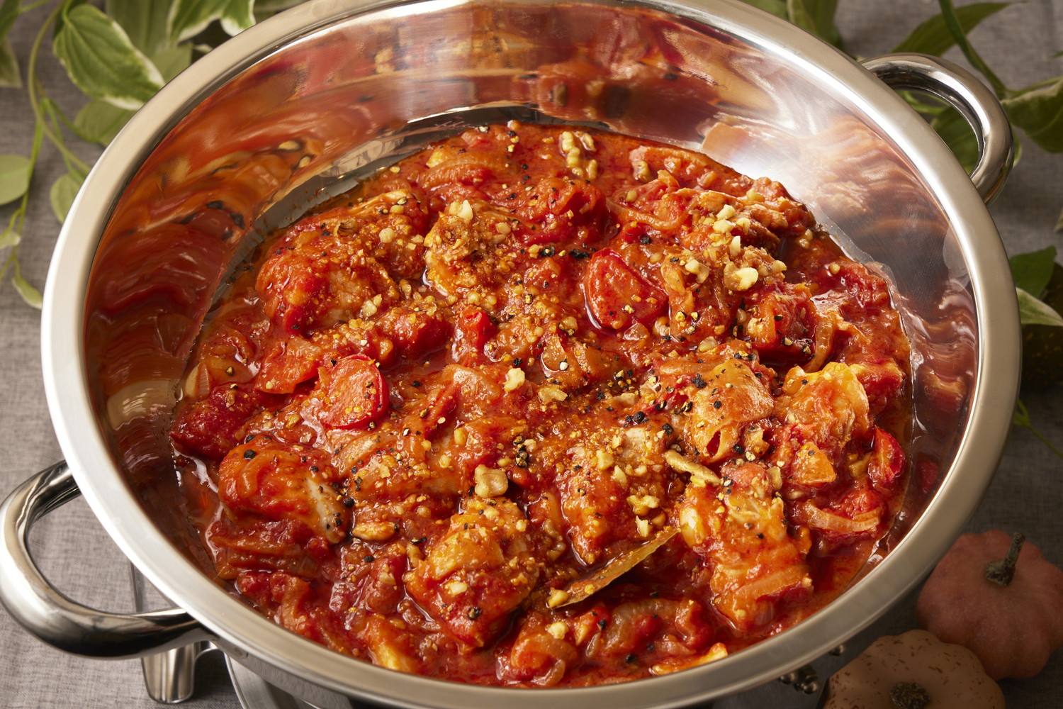 鶏モモ肉のポッタキオ(トマト煮込み)ガーリックライス添え